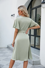 Load image into Gallery viewer, Tie Waist Flutter Sleeve Surplice Dress
