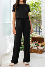 Load image into Gallery viewer, Round Neck Open Back Jumpsuit with Pockets
