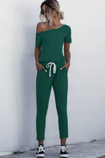 Load image into Gallery viewer, Asymmetrical Neck Tied Jumpsuit with Pockets
