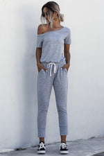 Load image into Gallery viewer, Asymmetrical Neck Tied Jumpsuit with Pockets
