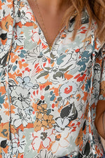 Load image into Gallery viewer, Floral Tie Neck Shoulder Detail Blouse
