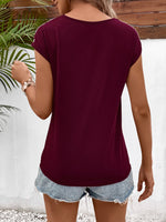 Load image into Gallery viewer, Spliced Lace V-Neck Twisted Hem Tee
