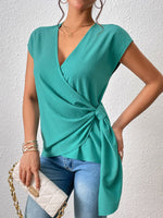 Load image into Gallery viewer, Tied Surplice Neck Short Sleeve Blouse
