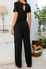 Load image into Gallery viewer, Round Neck Open Back Jumpsuit with Pockets
