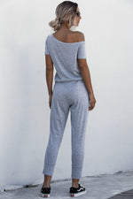 Load image into Gallery viewer, Asymmetrical Neck Tied Jumpsuit with Pockets
