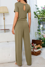 Load image into Gallery viewer, Round Neck Open Back Jumpsuit with Pockets
