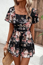 Load image into Gallery viewer, Floral Cutout Tie Back Romper
