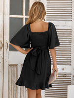 Load image into Gallery viewer, Smocked Tie Back Ruffle Hem Dress
