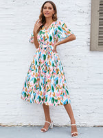 Load image into Gallery viewer, Printed Tie-Waist V-Neck Flutter Sleeve Dress
